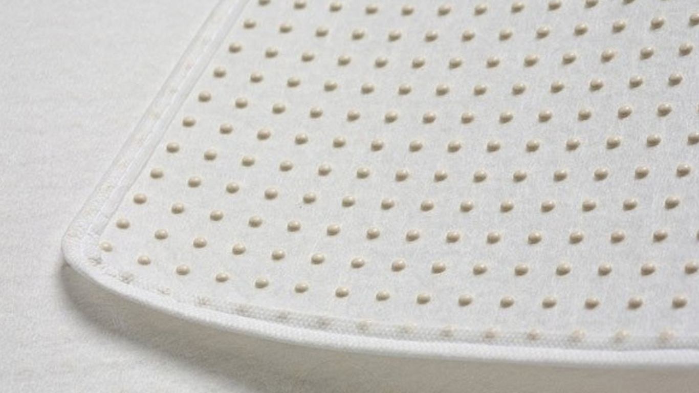 Matrasbeschermer met latex noppen detail